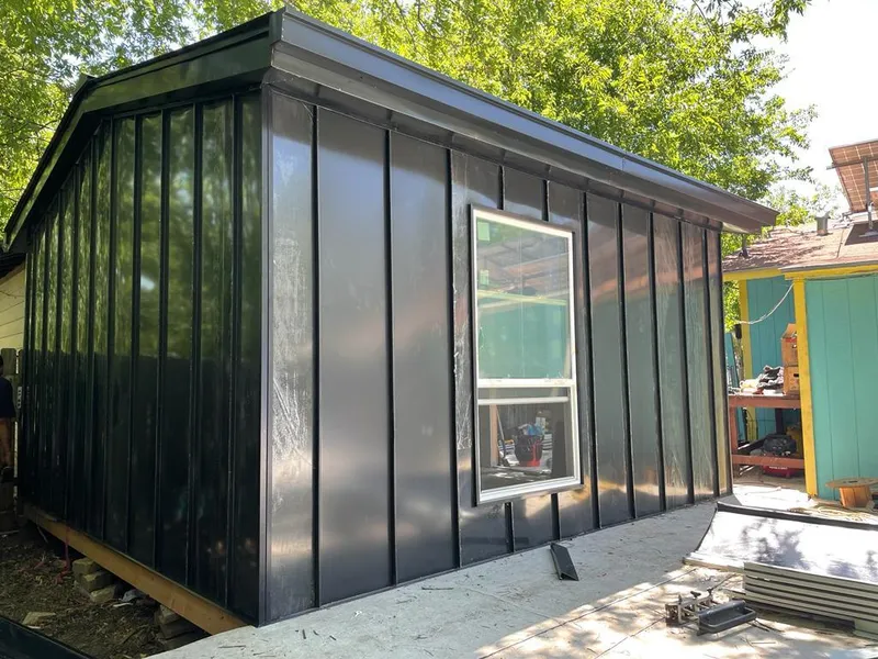 Black standing seam metal wall panels for Metal Roof Installation in New Hanover