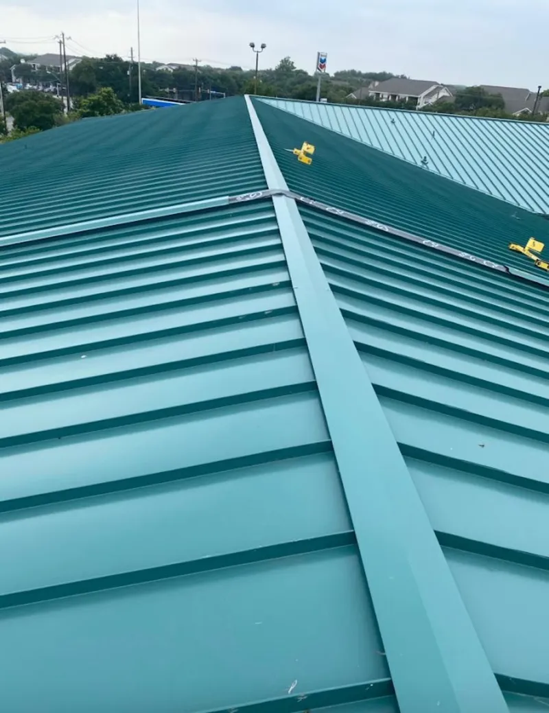 Green commercial metal roof ridge and valley for Metal Roof Repair in New Hanover